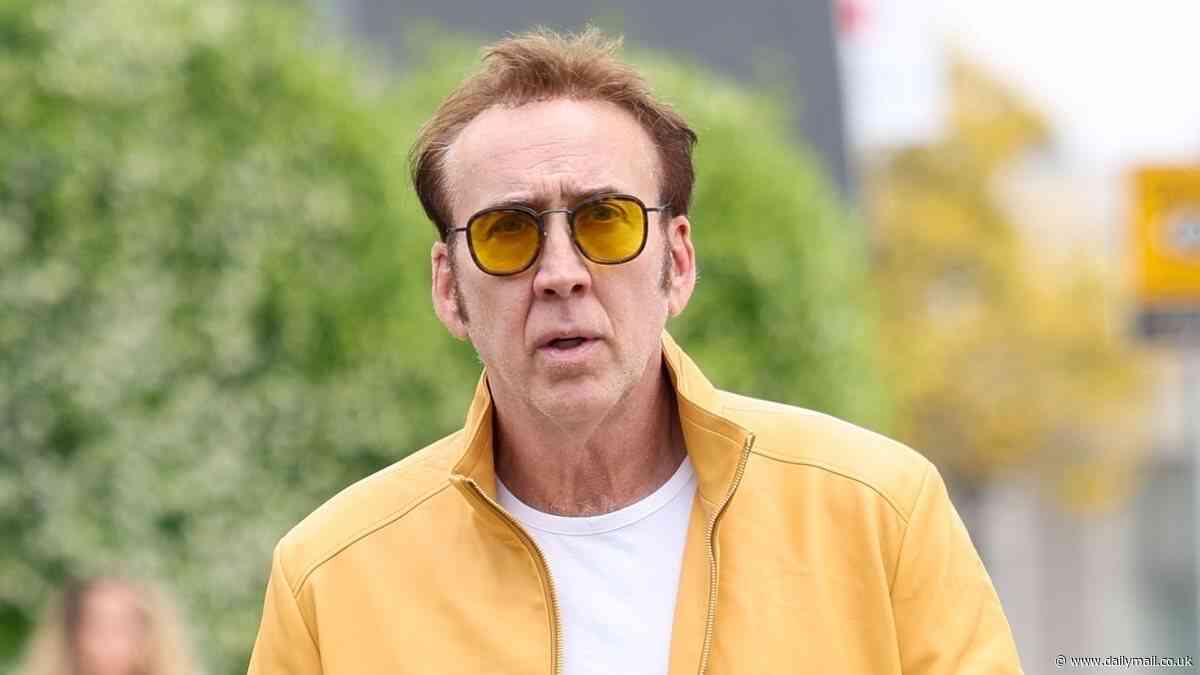 Nicolas Cage stands out in yellow jacket as he goes shopping in LA after debuting his new movie The Surfer at Cannes