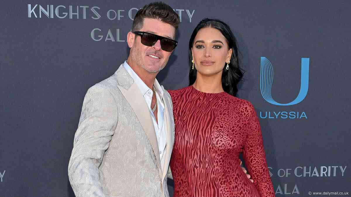 Robin Thicke, 46, puts on a loved-up display with his fiancee April Love Geary, 29, at the Knights Of Charity gala in Cannes