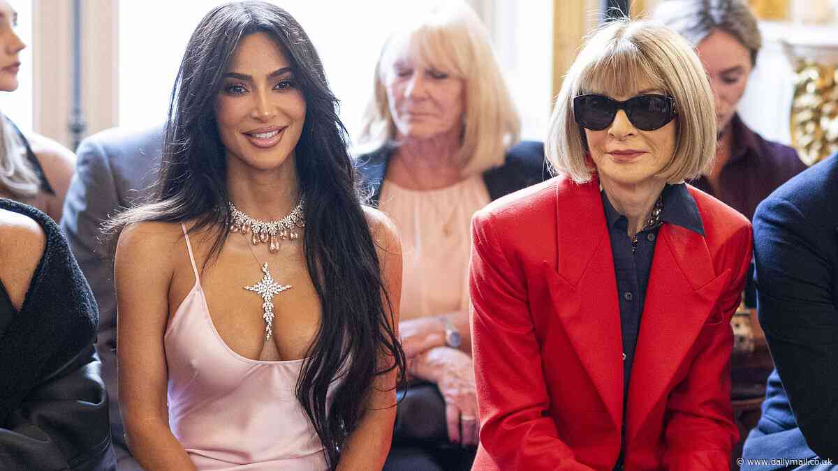 Kim Kardashian gets VERY frosty reception from Anna Wintour after rolling up late to Paris show and leaves Victoria Beckham puzzled after failing to recognize her own sister Kendall Jenner on catwalk