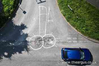Vandal sprays penises around potholes in West Sussex village