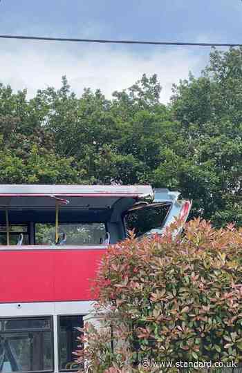 Children among 13 in hospital after bus and tractor crash in Kent