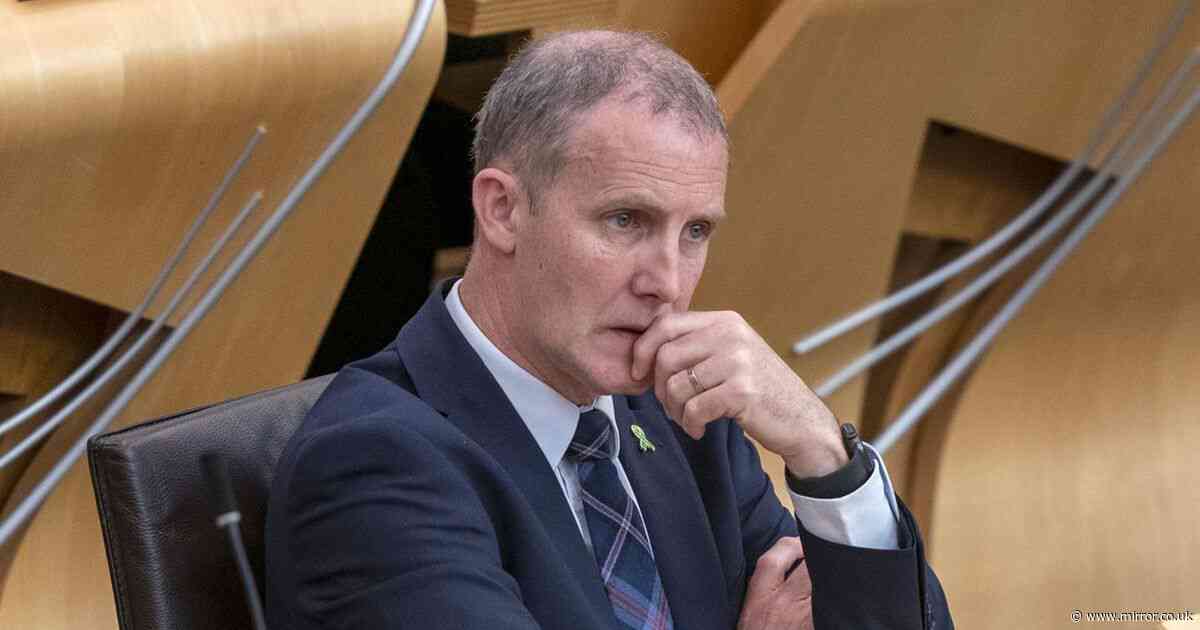 Ex-Scottish Health Secretary who racked up £11,000 iPad bill on holiday suspended