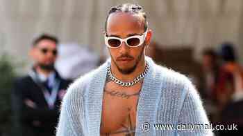 Lewis Hamilton bares his sculpted torso in a knitted blue cardigan as he walks the paddock ahead of the F1 Grand Prix in Monaco