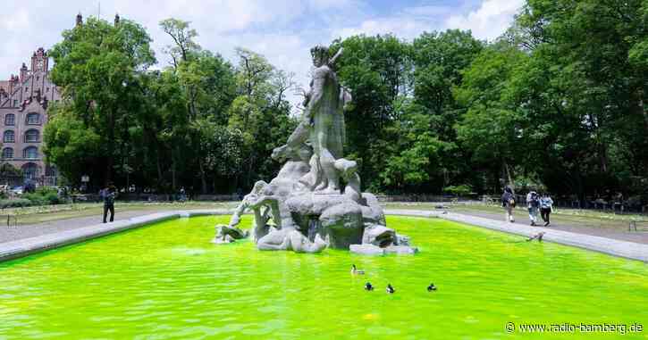 Münchner Brunnen giftgrün gefärbt: Aktion gegen Artensterben