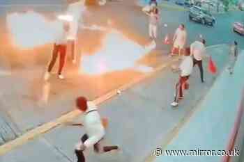 Dramatic moment fire-breather sets mariachi band on fire in blazing turf war fight over tips