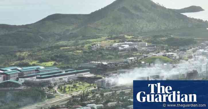 Drone footage of New Caledonia capital shows damaged buildings as Macron arrives  – video
