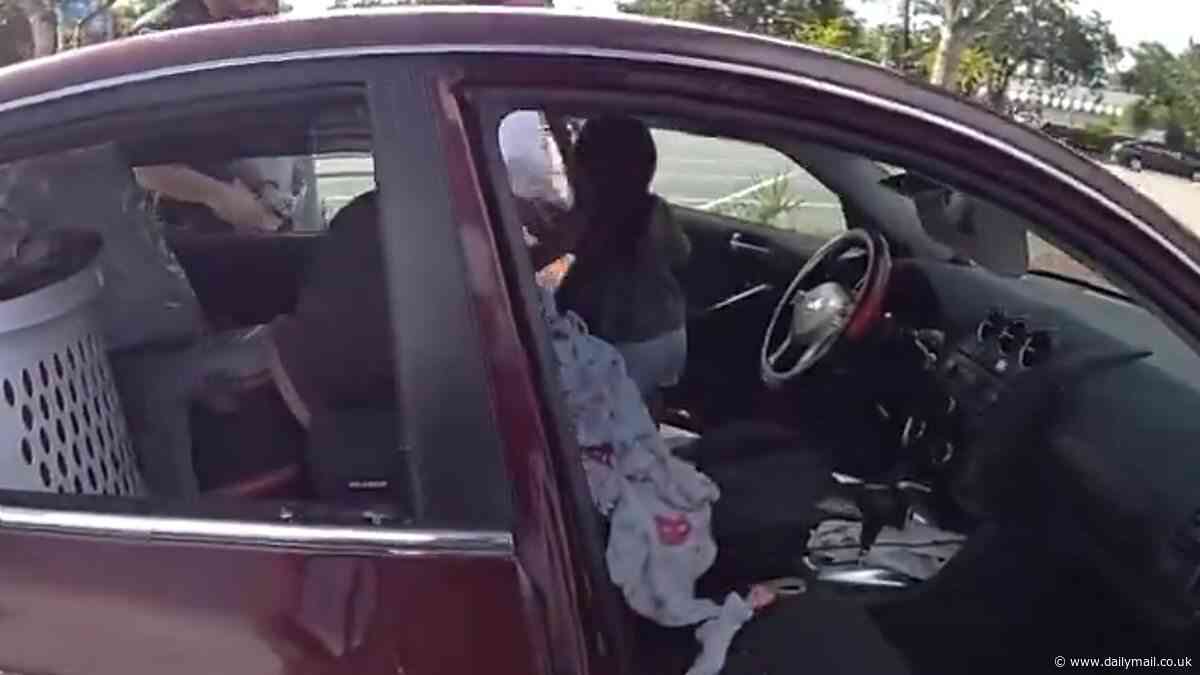 Dramatic moment Florida cop shatters window to rescue one-year-old child from hot car