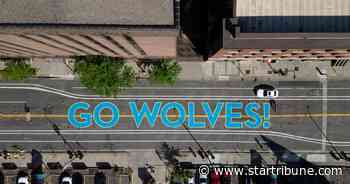 "Go Wolves!" mural pops up overnight on downtown Minneapolis' First Avenue