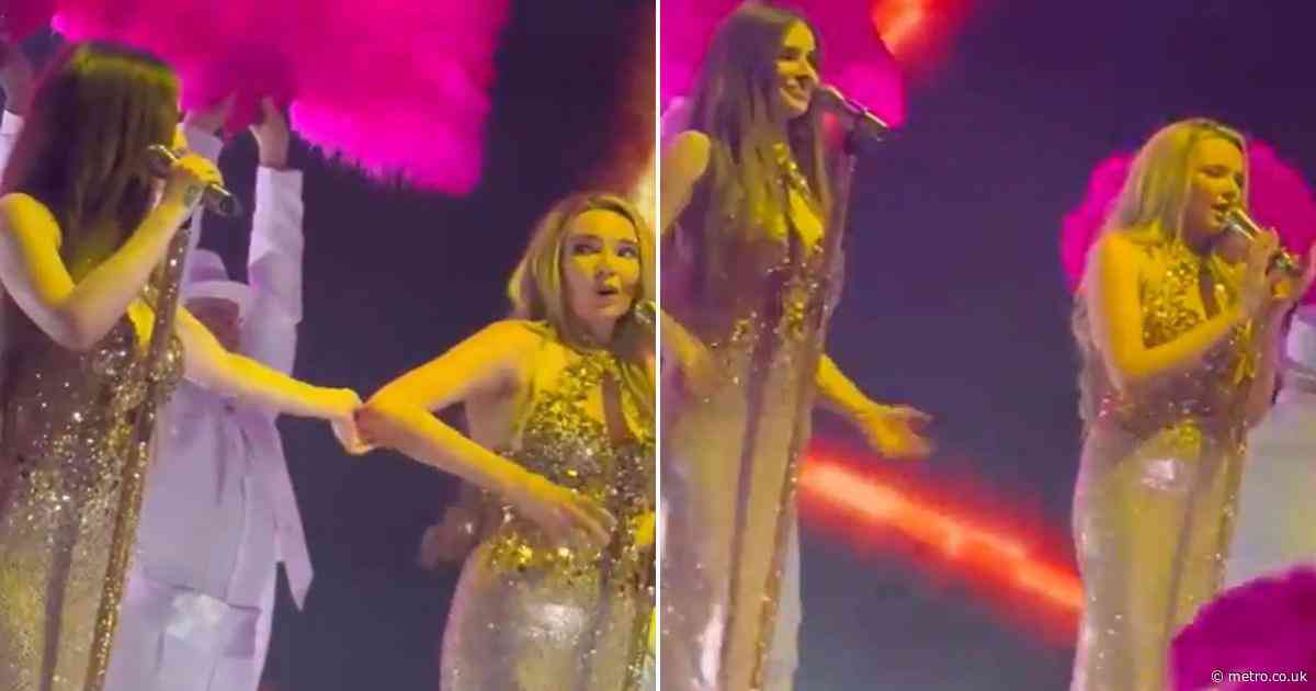 The sweet moment Nadine Coyle steps in to sing for Cheryl on Girls Aloud tour