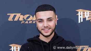 Katie Price's son Junior Andre cuts a casual figure in a black tracksuit at star-studded Thorpe Park launch party as he risks an awkward run-in with his mother's ex-fiancé Kris Boyson