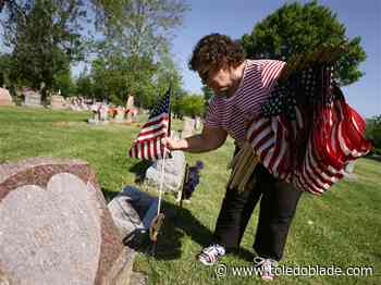 Photo Gallery: Flags placed for veterans at Lake Township Cemetery