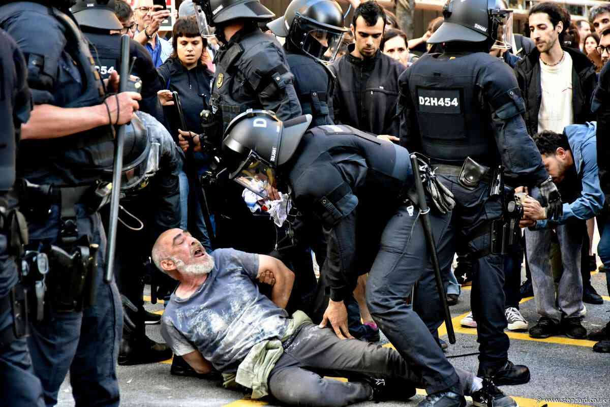 Violent protests erupt outside star-studded Louis Vuitton show in Barcelona