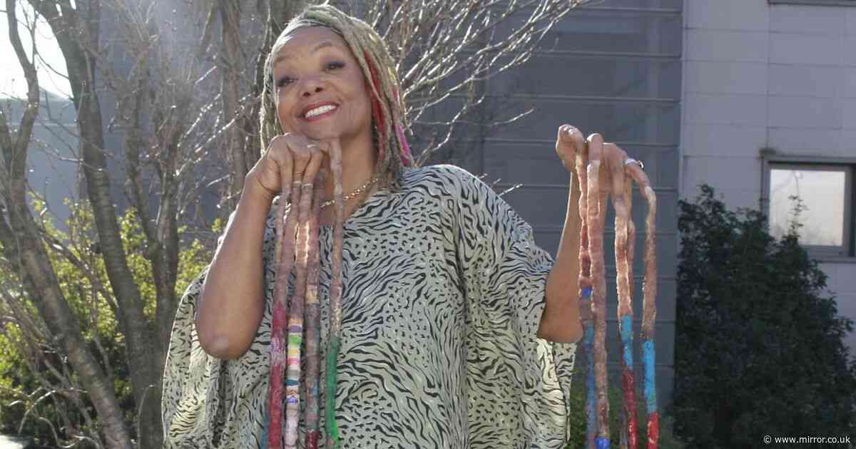 Woman with world's longest nails hasn't cut them in 27 years