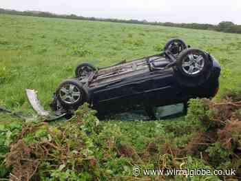 Police warning after car flips onto roof in Meols