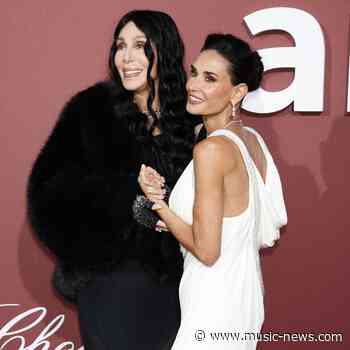 Demi Moore scolds audience member while introducing Cher at amfAR Cannes Gala