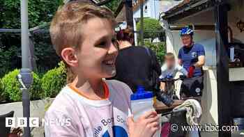 Boy, 11, raises £29k for charity with marathon cycle