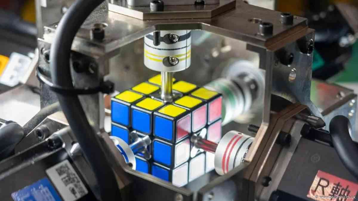 Blink and you'll miss it! Record-breaking robot can solve a Rubik's Cube in 0.305 seconds - 10 times faster than the quickest human