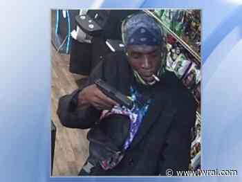 Durham police seek public's help in identifying armed convenience store robber