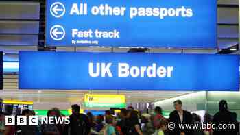Net migration to UK fell 10% last year, ONS says