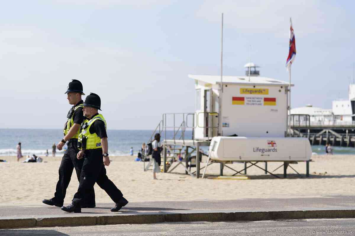 Boy, 17, arrested on suspicion of murder after woman stabbed to death on beach
