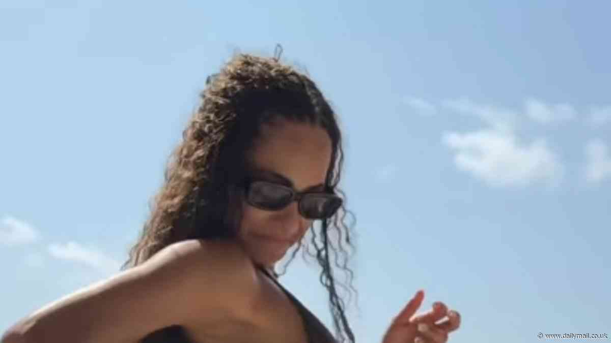 Love Island winner Amber Gill sets pulses racing in TINY bikini as she applies sunscreen in sizzling clip