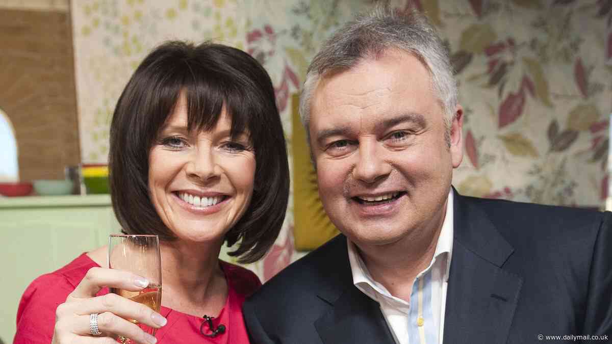 Divorce? What divorce? Eamonn Holmes is jubilant as he celebrates Manchester United's FA Cup win - despite splitting up with Ruth Langsford as marriage ends