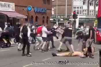 Man left 'unconscious' on street as Man Utd and Man City fans clash in violent brawl before FA Cup final