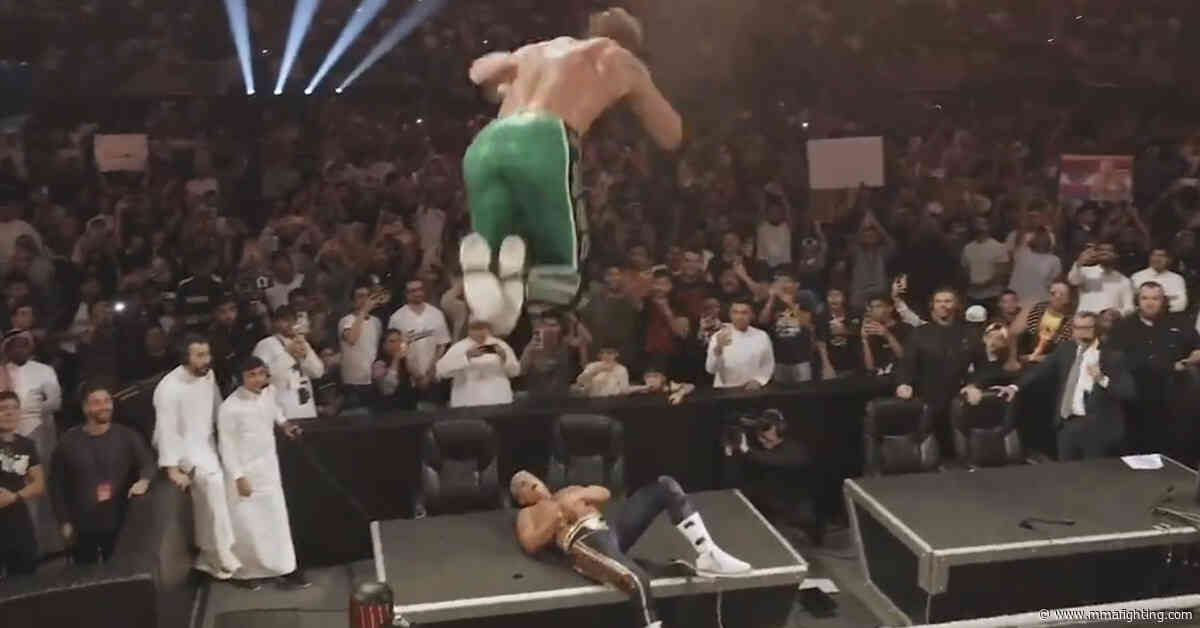Video: Logan Paul hits insane frog splash through announce table but loses match to Cody Rhodes