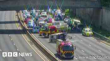 Overturned campervan causes six-mile queues