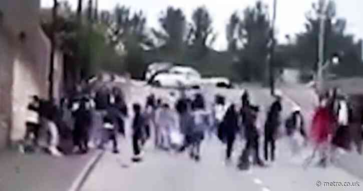 Twenty five arrested after massive street fight leaves ten seriously injured