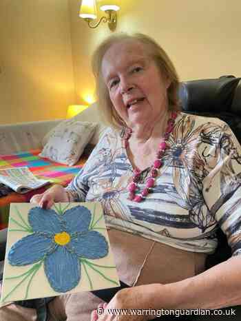 Poignant artwork created by community at Lymm care home