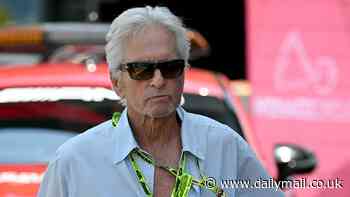 Michael Douglas, 79, keeps it casual in unbuttoned shirt and cargo pants as he takes over pit lane at star-studded F1 Grand Prix in Monaco
