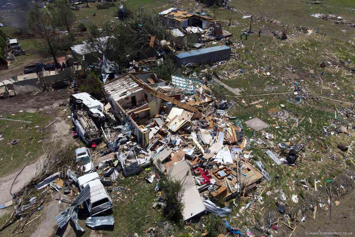 Two children among at least 15 dead after severe storms tear across US