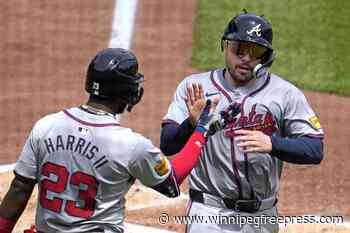 Acuña leaves early with sore left knee, Sale improves to 8-1 as Braves top Pirates 8-1