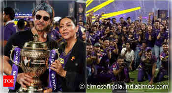 Shah Rukh Khan and Gauri pose with IPL trophy