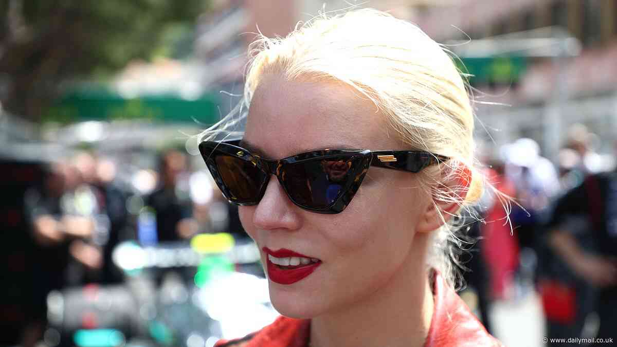 Anya Taylor-Joy dons unique £1,150 black loafers split between the toes and tiny black playsuit as she excitedly greets Winnie Harlow and Kyle Kuzma at F1 Grand Prix in Monaco