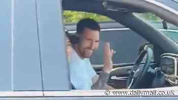 Lionel Messi winds down his car window to talk with fans while sitting in traffic as incredible clip goes viral: 'He's too humble'