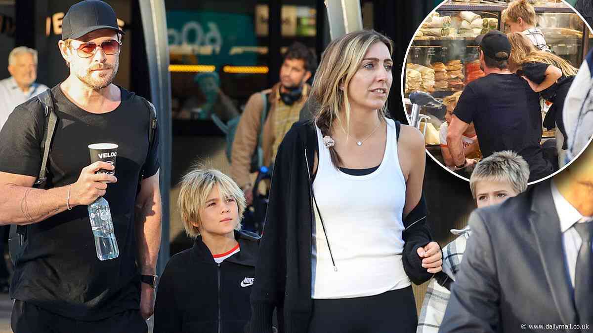 Chris Hemsworth arrives back in Australia with his glamorous blonde assistant and three children following global Mad Max tour
