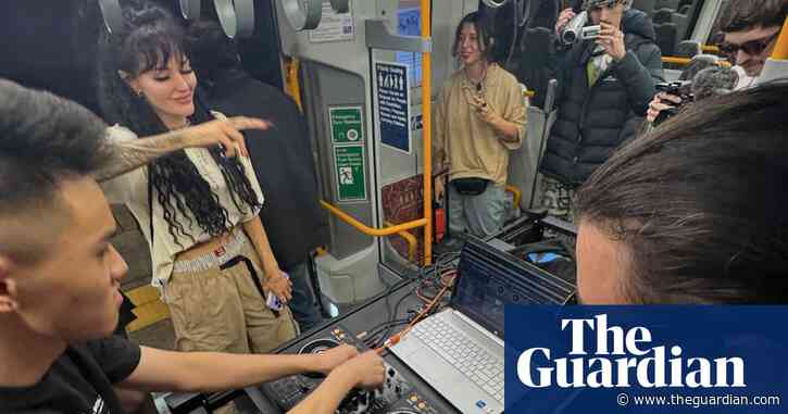 ‘Like a moving stage’: Brisbane commuters surprised by impromptu ‘train rave’