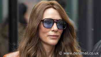 Cate Blanchett looks unrecognisable as she swaps her platinum blonde bob for a long brunette wig while filming spy thriller Black Bag in London