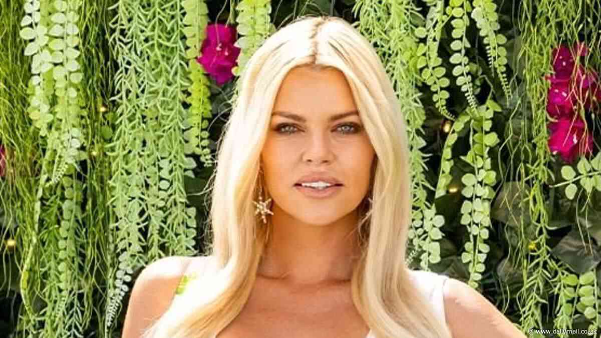 Sophie Monk looks worse for wear as she suffers EPIC fake tan fail amid torrential downpour: 'Does this look natural?'