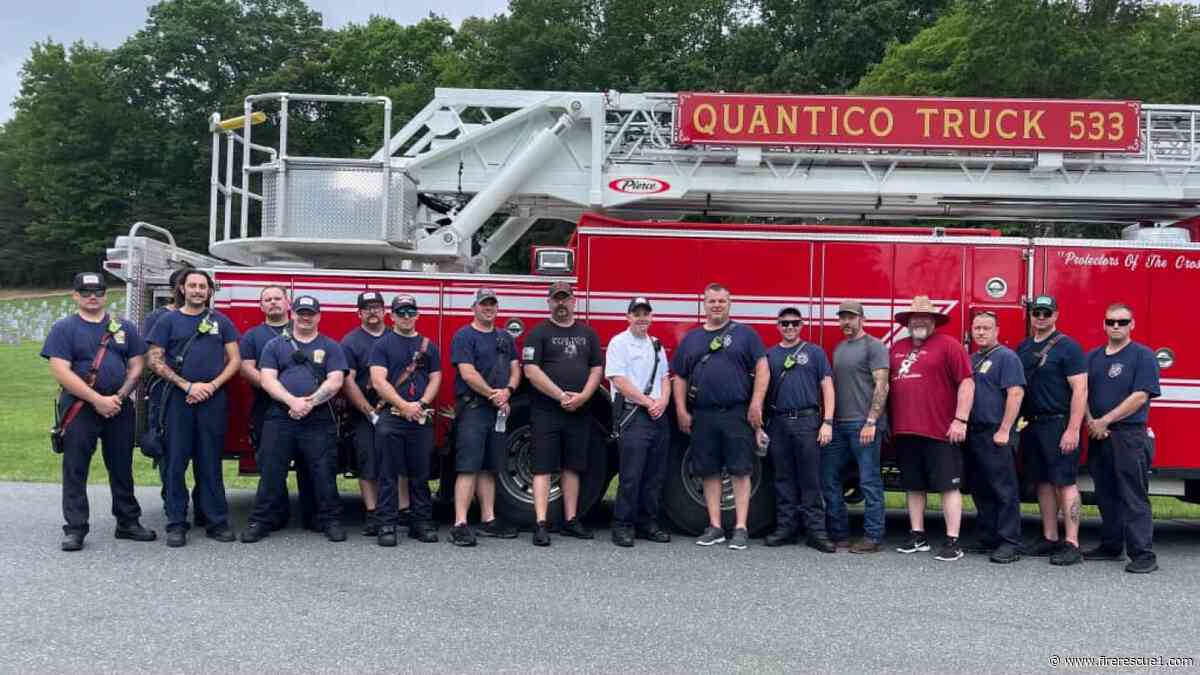 Firefighters help Va. man place flags at cemetery for Memorial Day