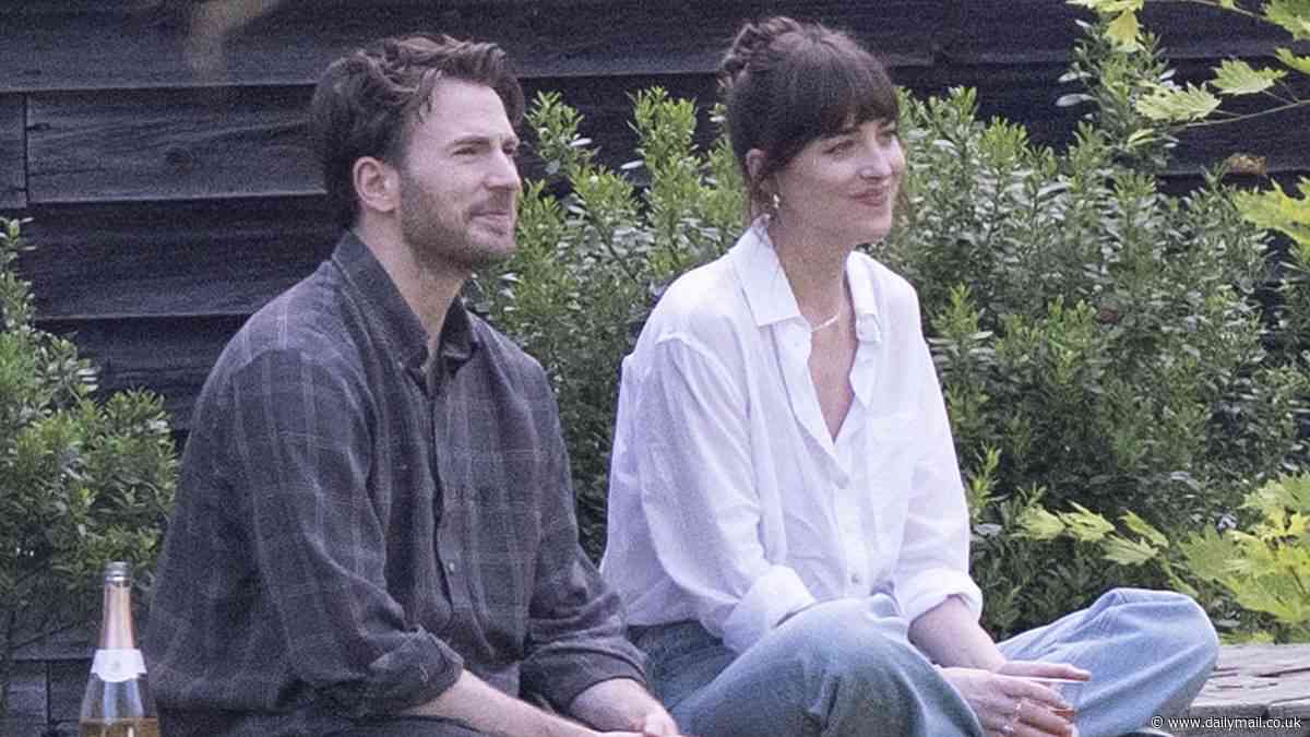 Dakota Johnson shares a bottle of wine with Chris Evans while shooting The Materialists... after she was seen kissing Pedro Pascal for the same film