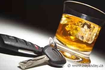 Asleep at the wheel, woman facing impaired charges