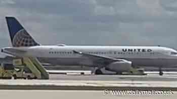 Terrifying moment United Airlines plane catches fire before takeoff at Chicago's O'Hare airport sparking travel chaos on busy Memorial Day