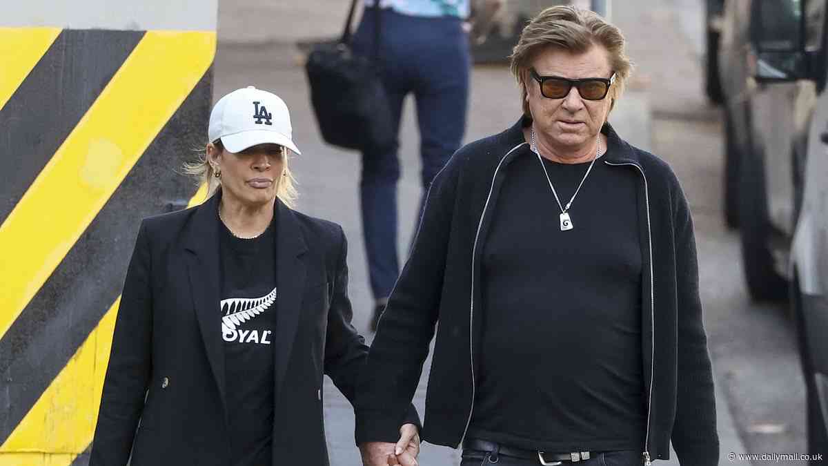 Richard Wilkins, 69, puts on a loved-up display with his make-up artist girlfriend Mia Hawkswell, 47, as they hold hands while running errands