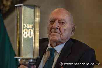 D-Day veteran passes commemorative torch to pupils to mark 80th anniversary