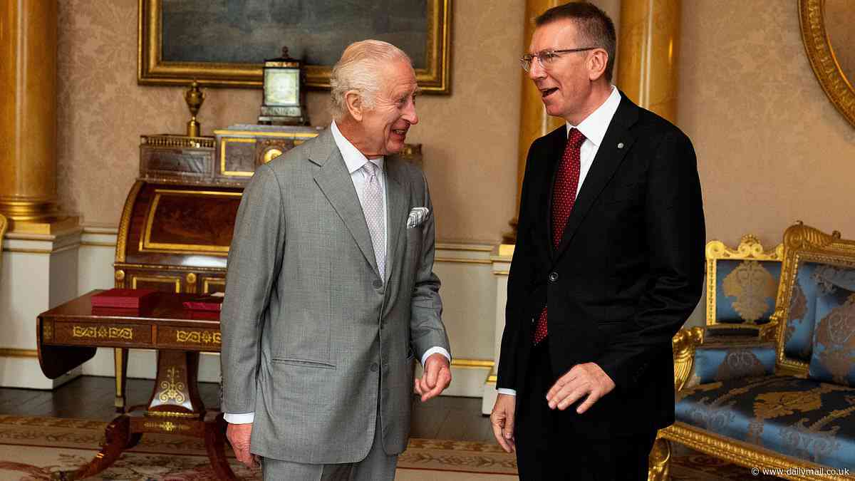 King Charles smiles as he meets Latvia's President Edgars Rinkevics in private audience at Buckingham Palace