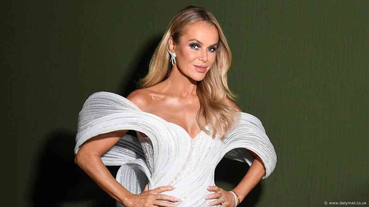 Amanda Holden risks another wardrobe malfunction in a dazzling futuristic dress during Britain's Got Talent's second live semi-final