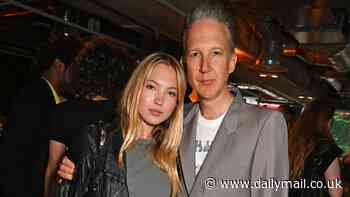 Lila Moss, 21, makes a rare public appearance with her father Jefferson Hack, 52, as they attend Rankin's new art exhibition